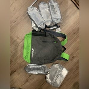 Limited addition Shaklee silver Youth cosmetic bag and backpack